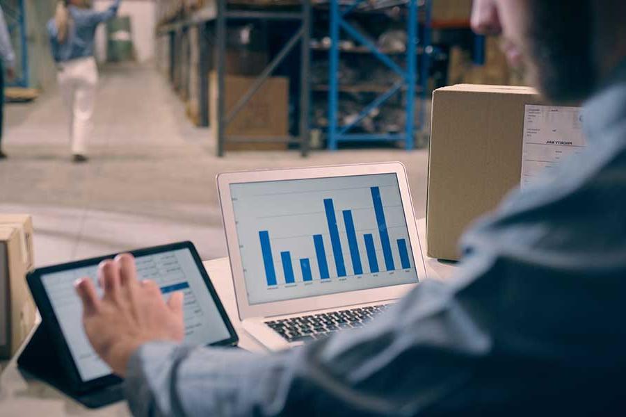 Individual looking at a data flow dashboard